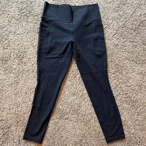 Athleta Salutation Stash Tight in navy